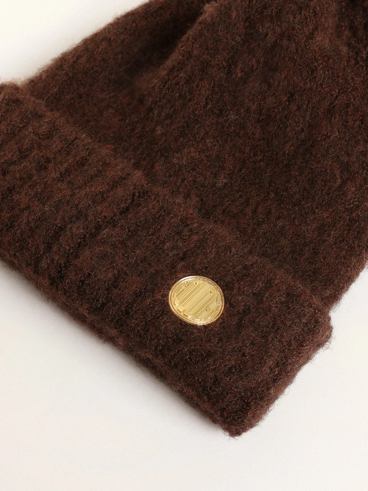 Coffee-colored wool beanie with pompom