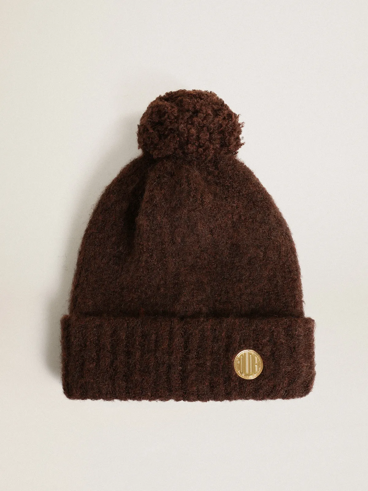 Coffee-colored wool beanie with pompom