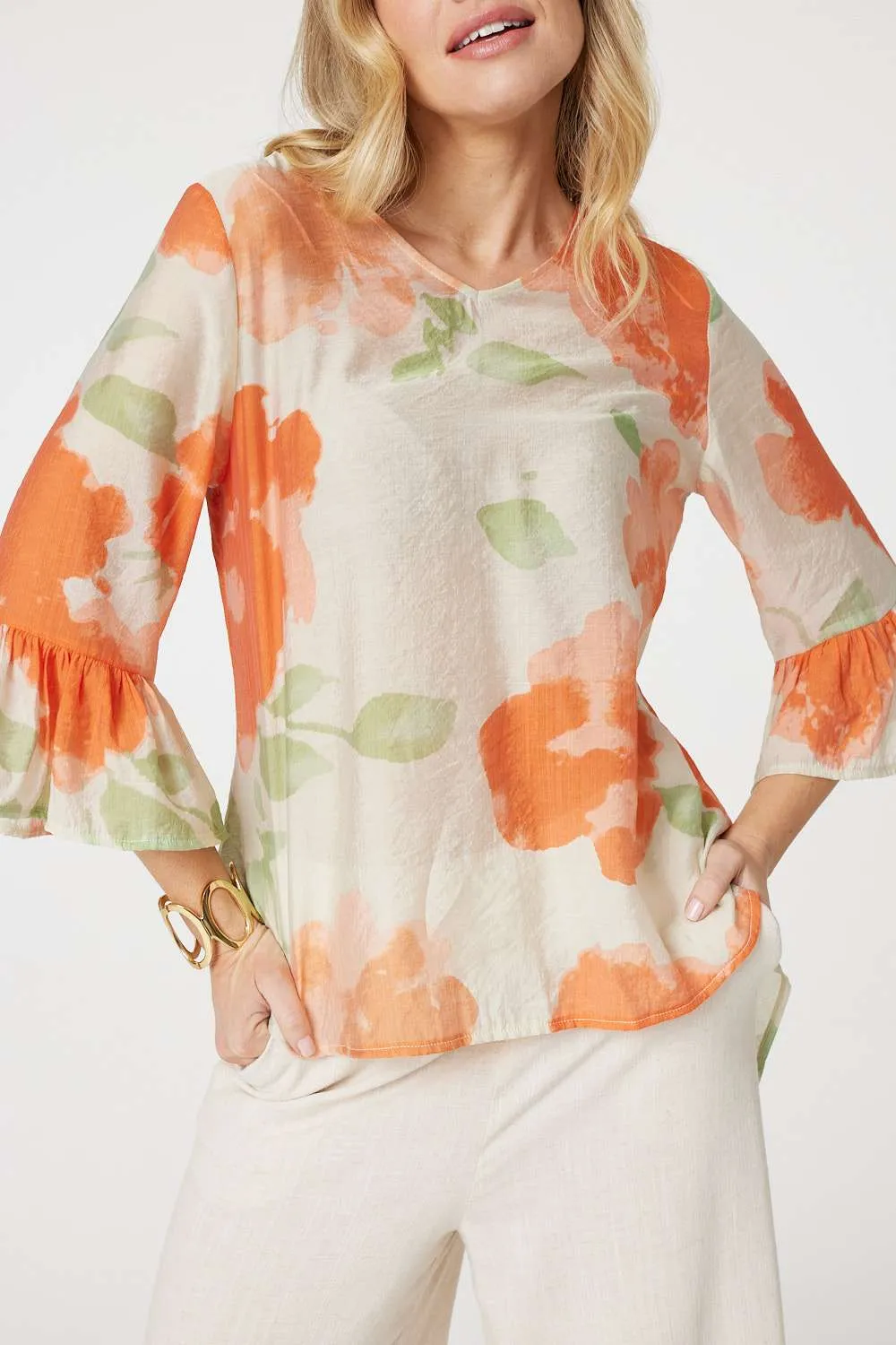 Floral Flute Sleeve High Low Blouse