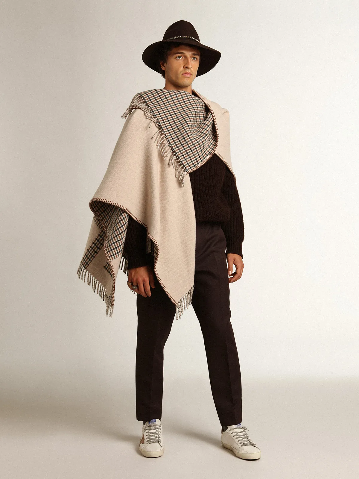 Poncho in double face cream-colored wool with check pattern and lettering