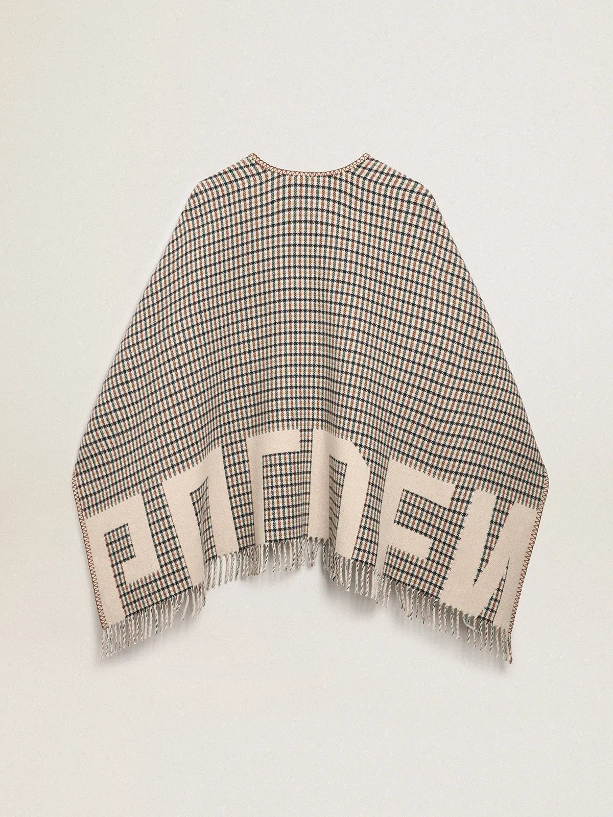 Poncho in double face cream-colored wool with check pattern and lettering